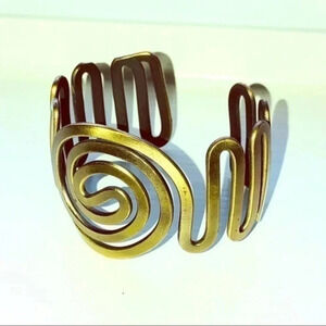 Metallic golden tone women bracelet